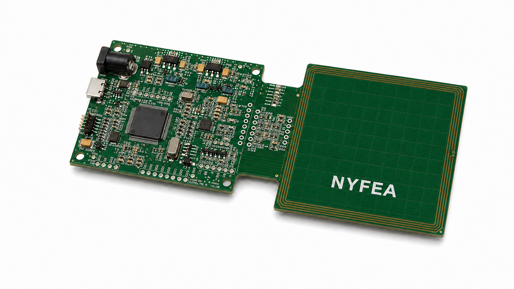 NYFEA green NFC reader development board and large antenna PCB photographed from a 40-degree oblique angle